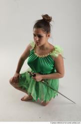 KATERINA KNNELING POSE WITH SWORD